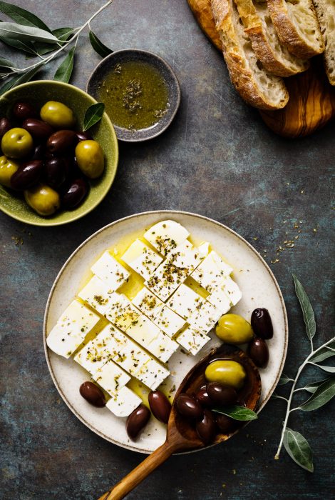 Feta cheese, olives and ciabatta, top view